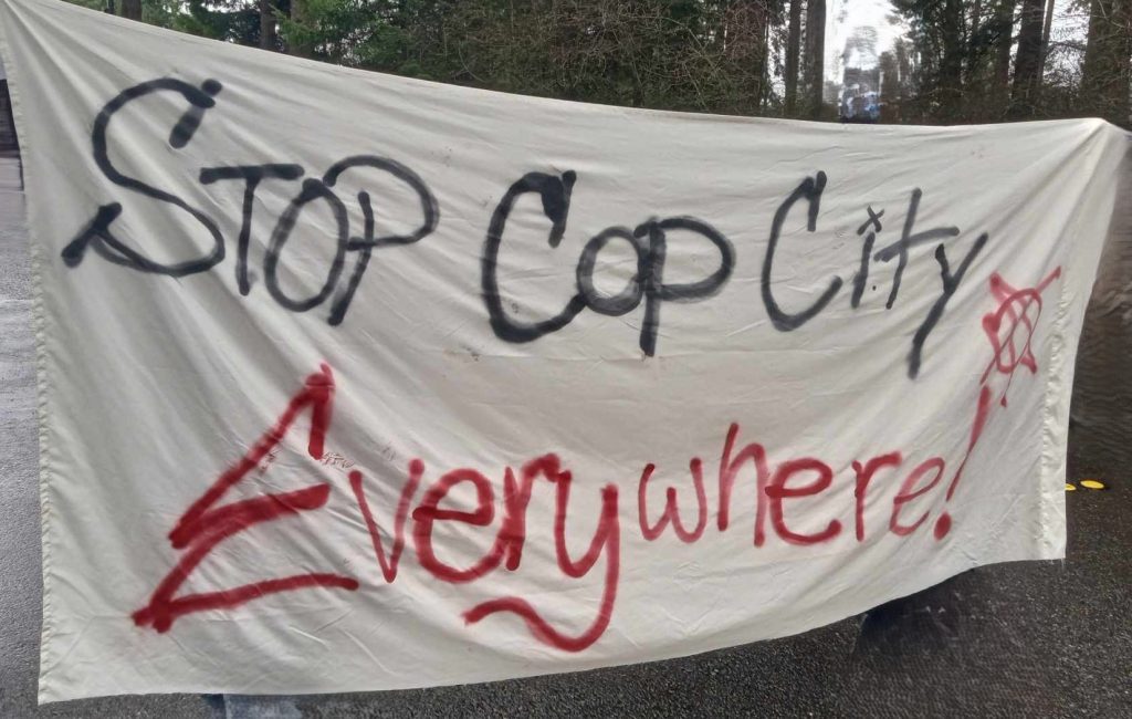 A Banner that Reads "Stop Cop City Everywhere"